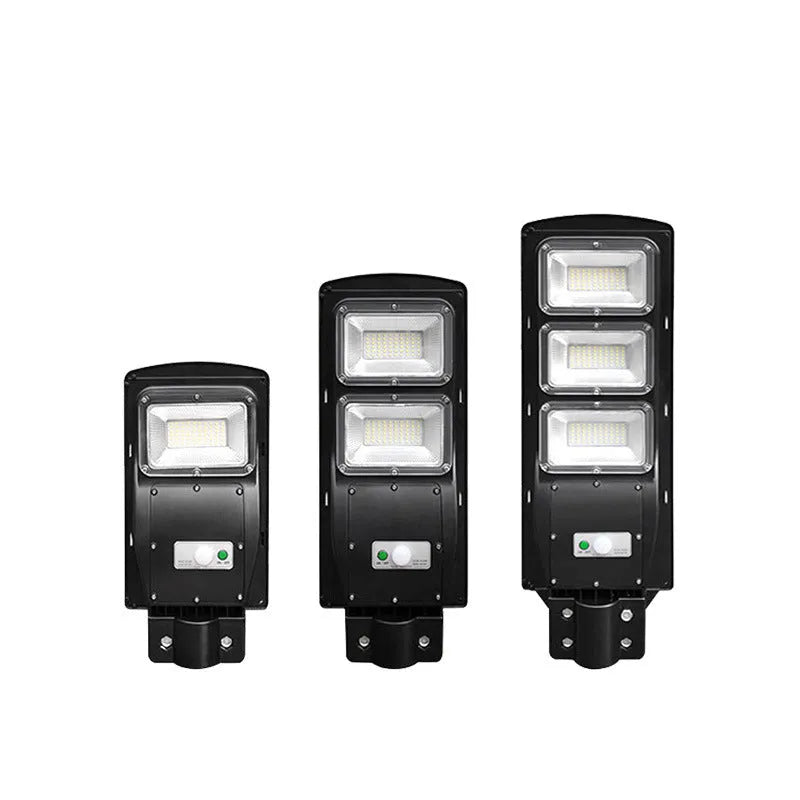 Integrated solar street light unit with solar panel and LED light in one housing