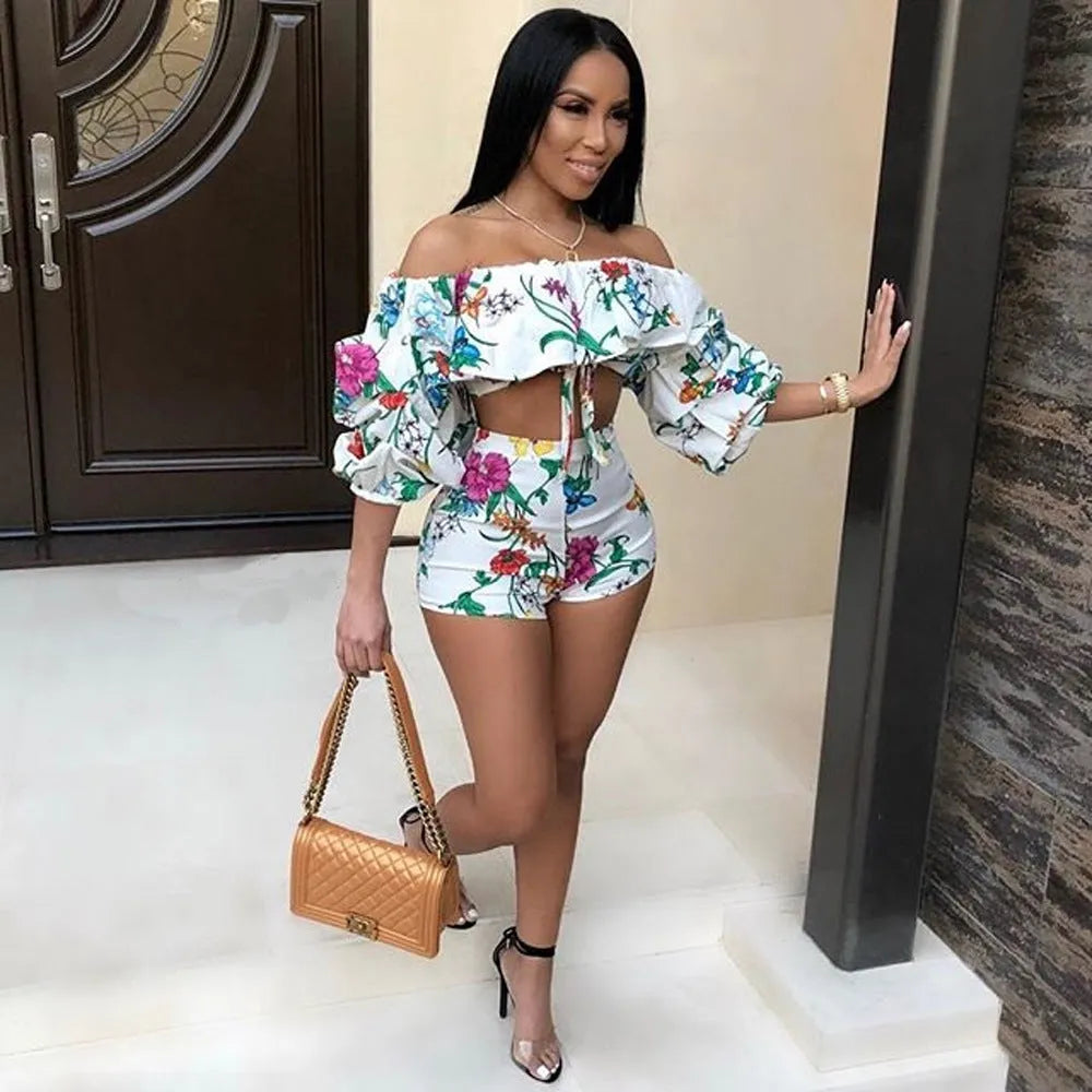 Multicolour digitally printed women's two-piece lounge set with pile sleeves and shorts.
