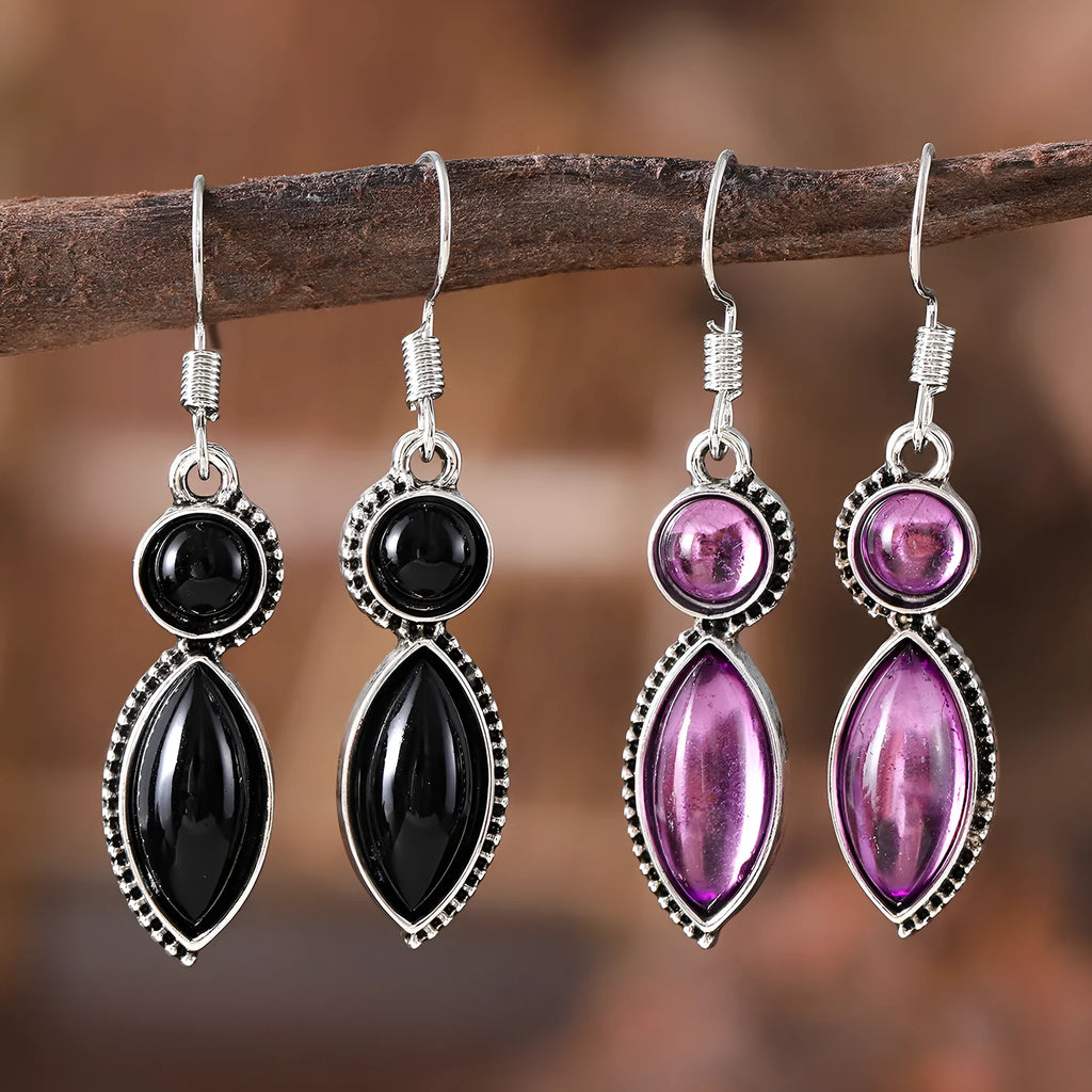 Vintage geometric zinc alloy earrings with electroplated black or purple colour and round pendant elements