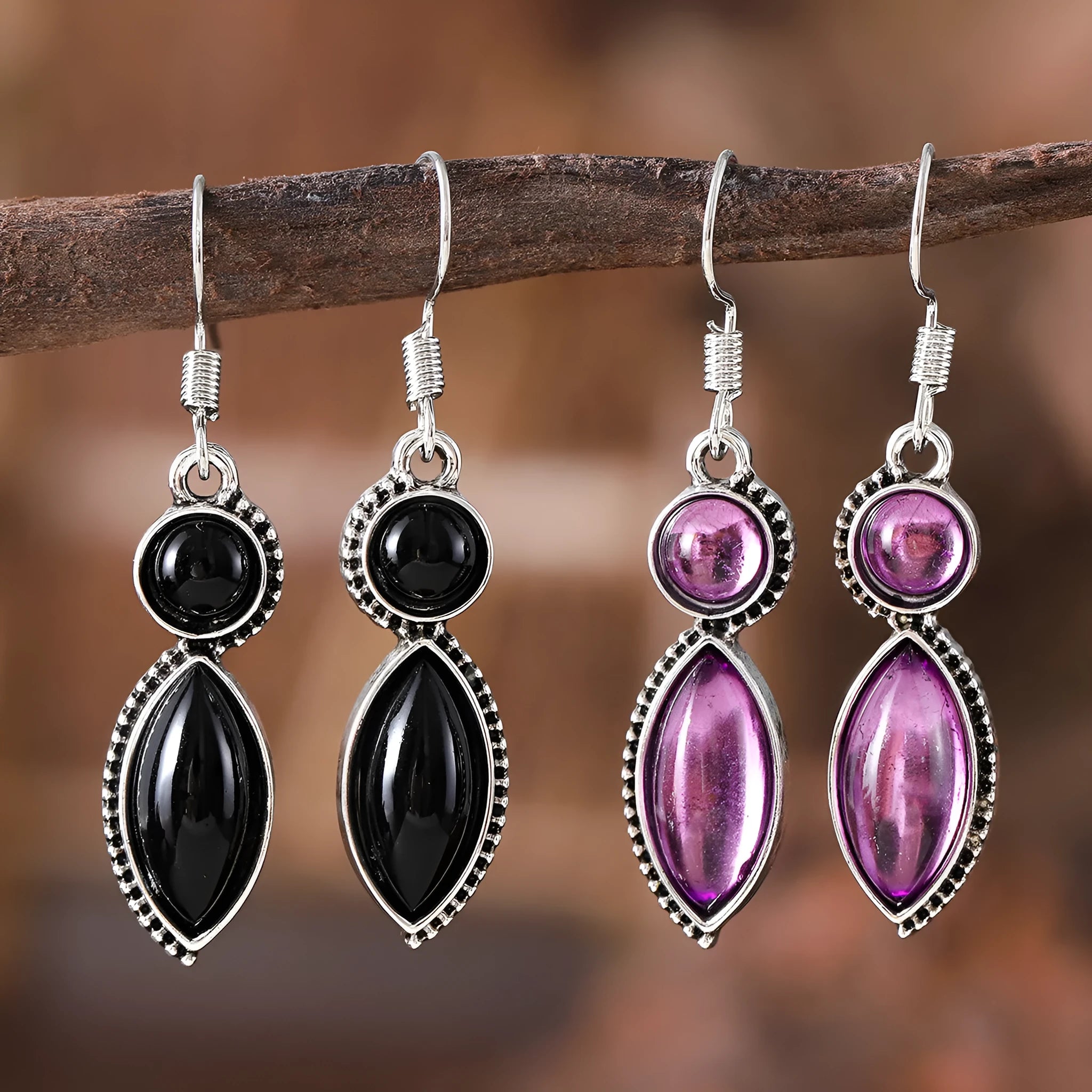 Vintage geometric zinc alloy earrings with electroplated black or purple colour and round pendant elements