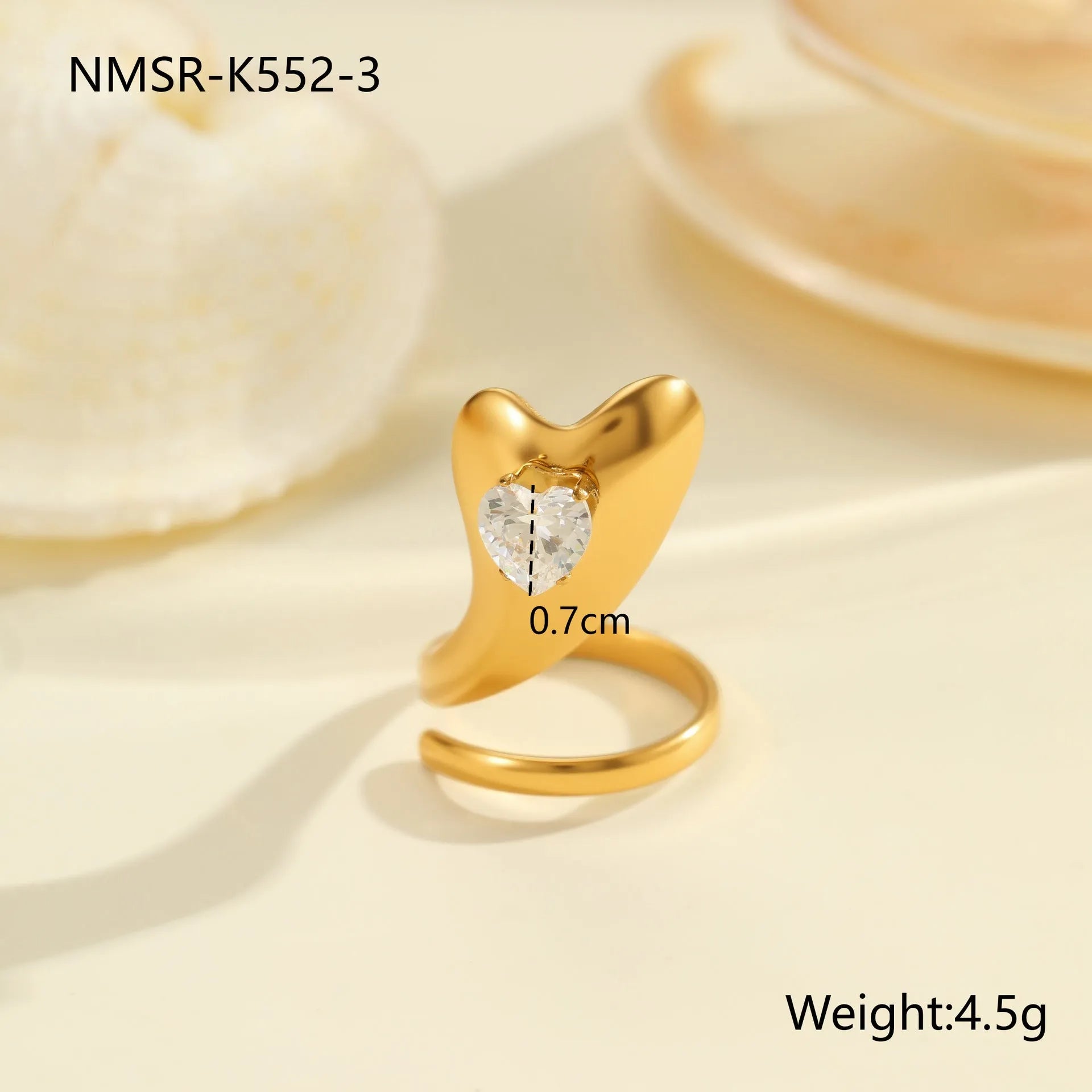 Women's geometric zircon ring with adjustable open mouth design on a hand.