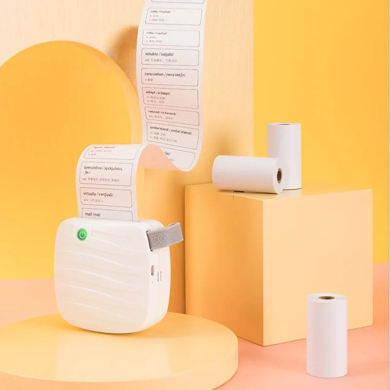 Three rolls of 57mm wide white thermal paper on a 30mm core, packaged together.