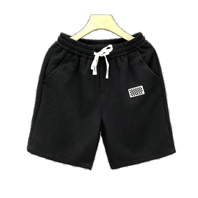 Casual polyester sports shorts in solid colour with micro elasticity, American style design