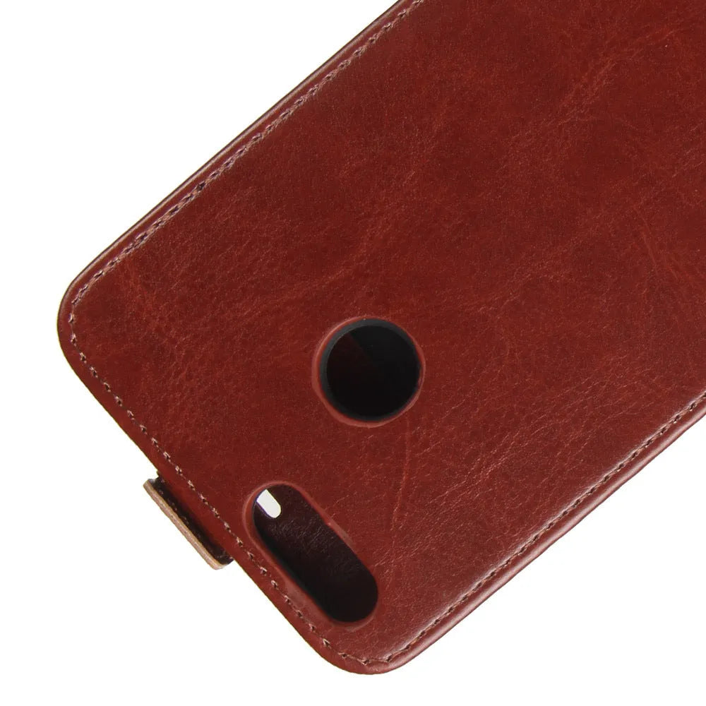 Black genuine leather wallet phone case for Huawei Honor 7X with a crazy horse pattern, showing open card slots.