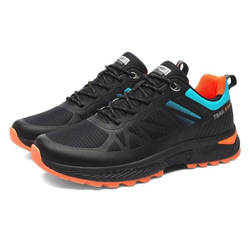 Men's plus size black and orange breathable mesh running shoes with lace-up front and rubber sole.
