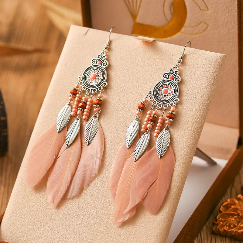 Feather pattern drop earrings with round oil craft design in alloy with electroplated finish