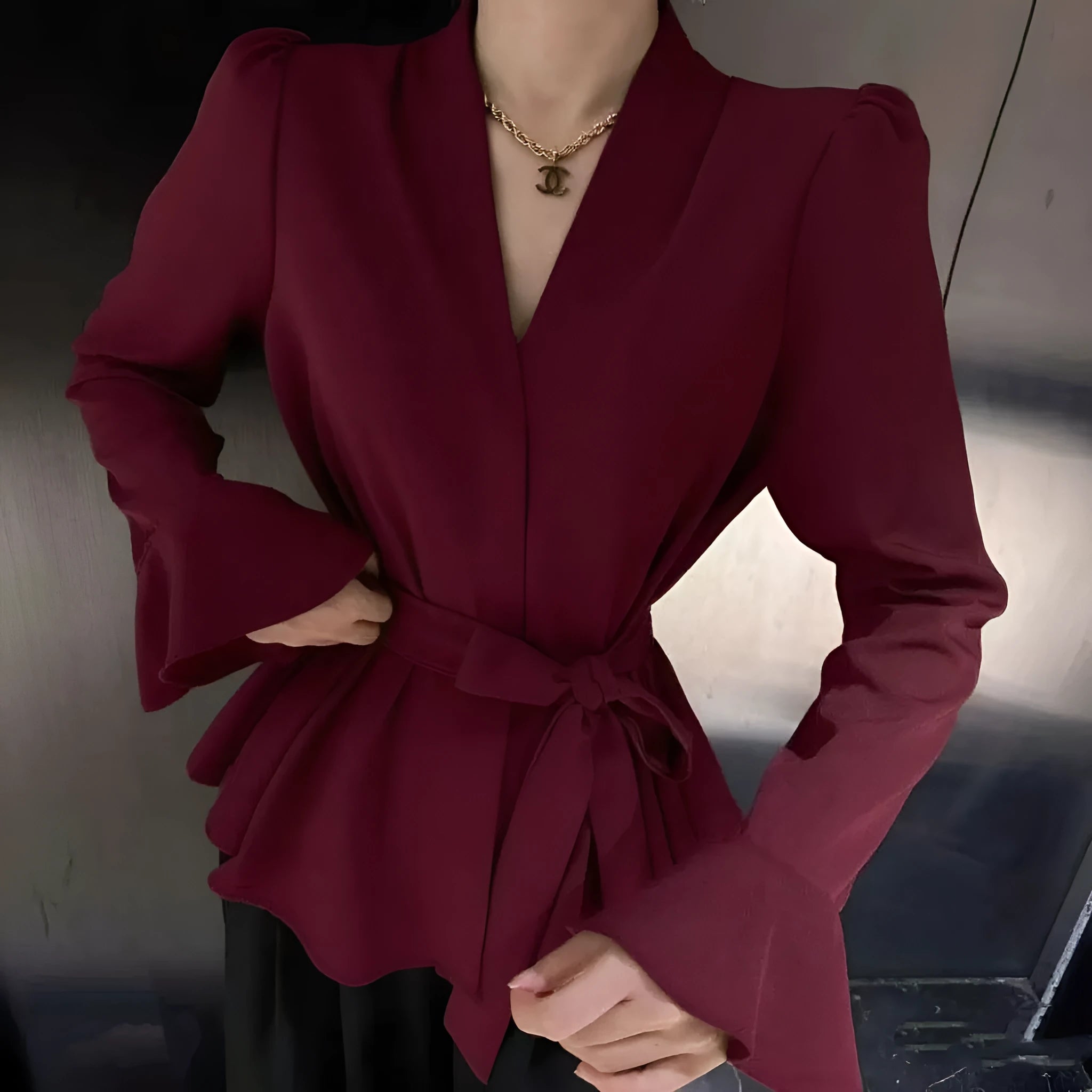 Women's French-style irregular collar long sleeve shirt with bell sleeves in a wine red colour.