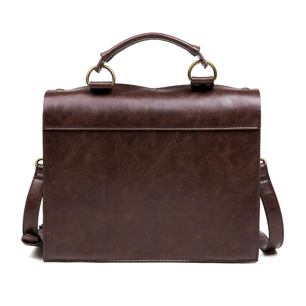 Bronze steampunk industrial retro style shoulder bag showing metal hardware details and pillow bag shape