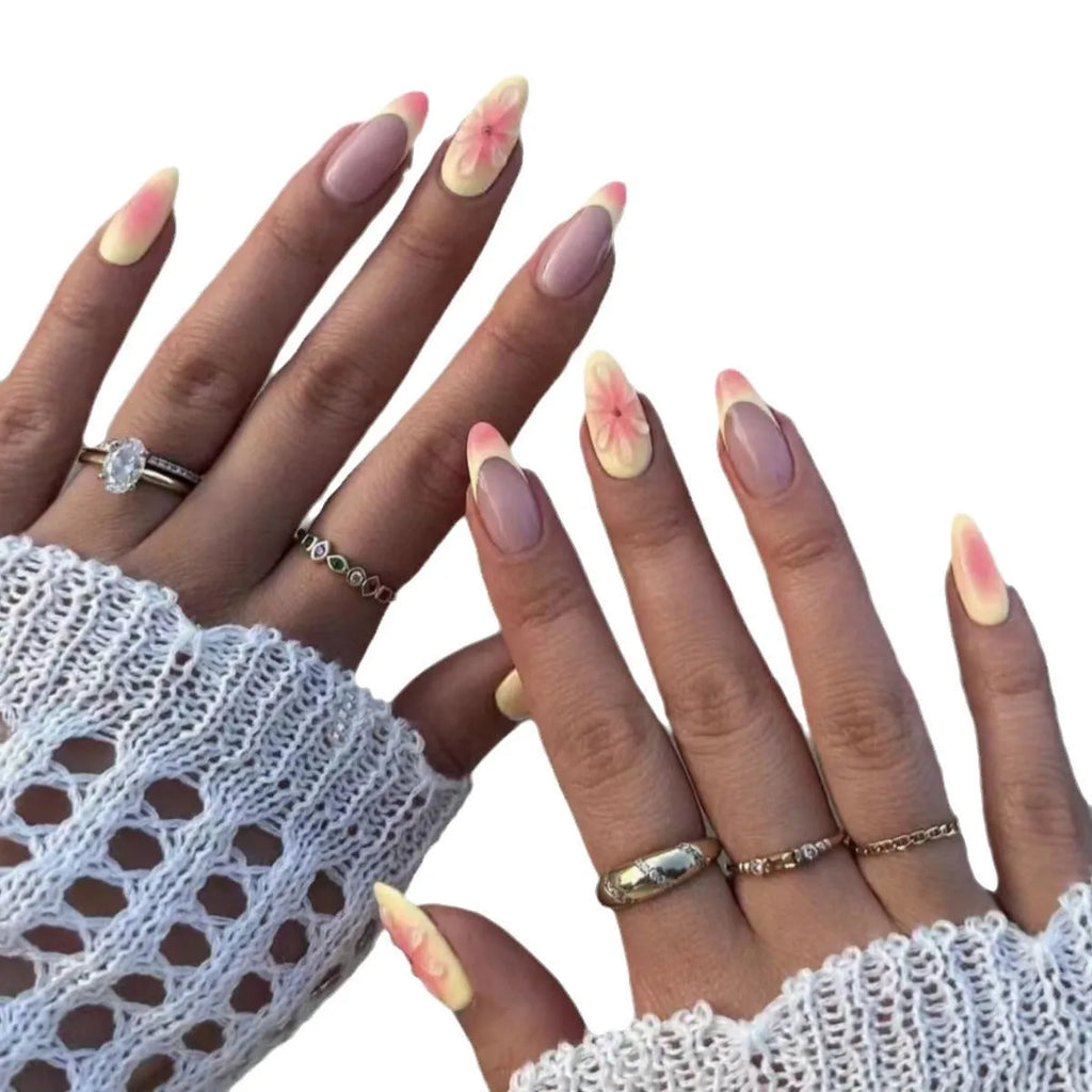 Fake nails with 3D cartoon flower designs on plastic wearable armour pieces in colour TY-318