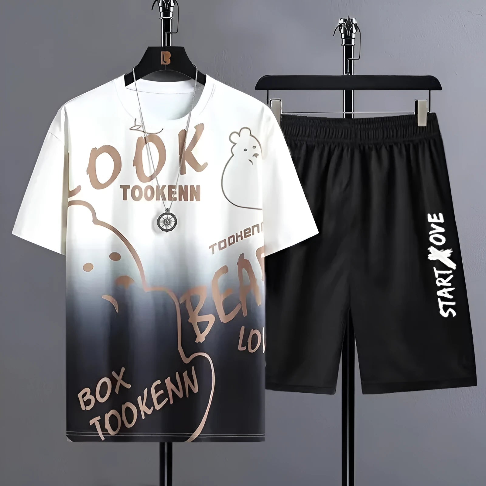 Men's light grey summer shorts suit set consisting of a short-sleeve T-shirt and matching shorts on a hanger.