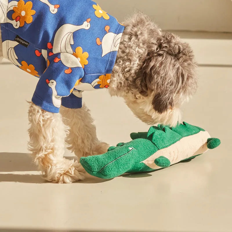 Green durable plush dog toy with squeaker, shown at 35 cm length for scale.