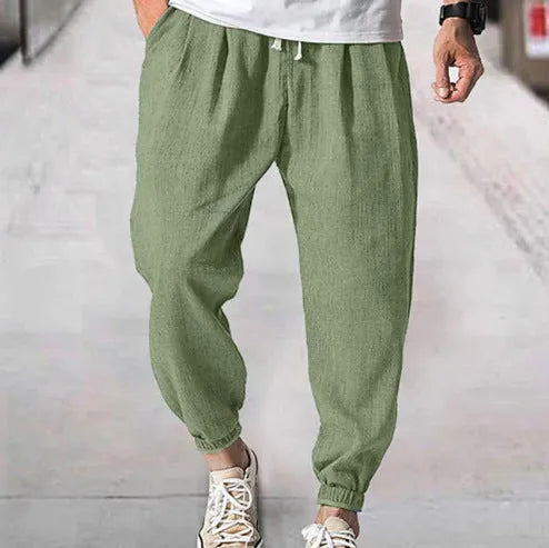 Men's loose-fit cotton trousers with elastic ankle cuffs in multiple colour options