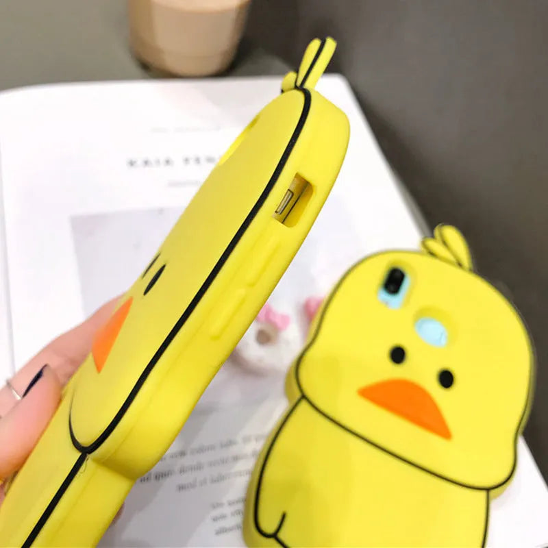 Green silicone iPhone case with cartoon animal design showing drop protection features