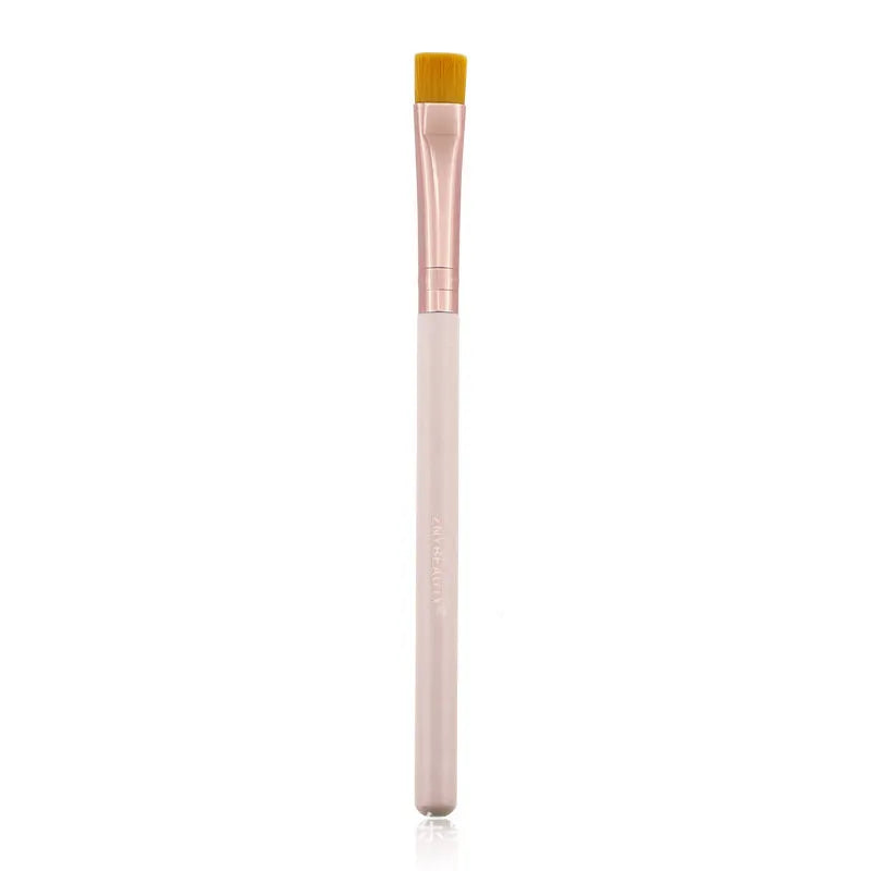26 pink wooden handle makeup brushes arranged in a pink PU zip case.