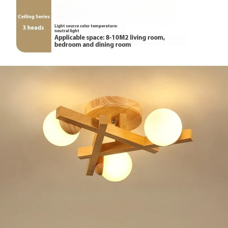 Wooden style modern Nordic ceiling light fixture with three neutral light heads.