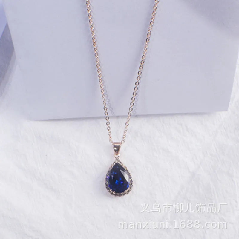 Rose gold plated drop pendant necklace with colourful rhinestones in a pink colour option.