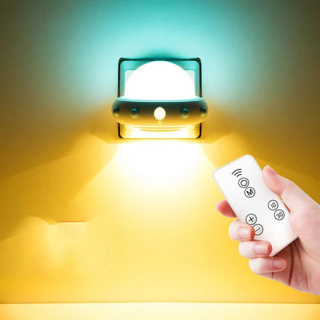Remote control UFO shaped bedside night light in blue, pink or white colours