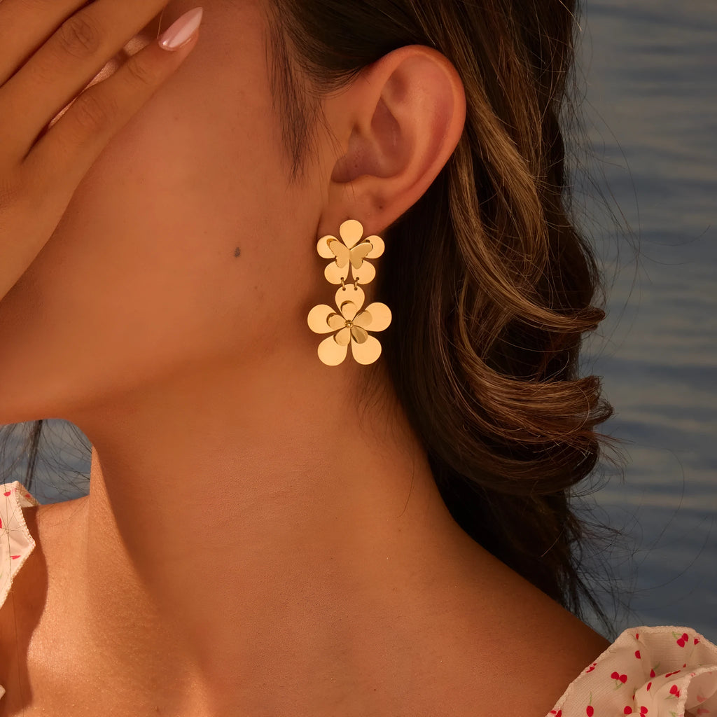 Gold flower butterfly earrings made from stainless steel with 18K electroplated finish