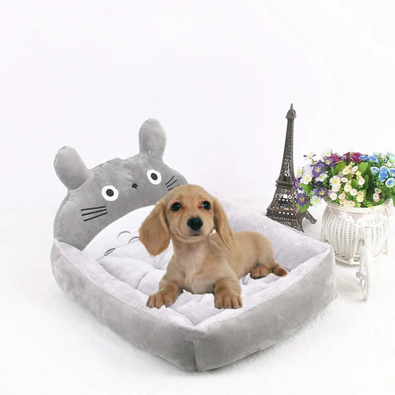 A cartoon-style washable pet bed sofa for small dogs and cats, shown in a blue colour.