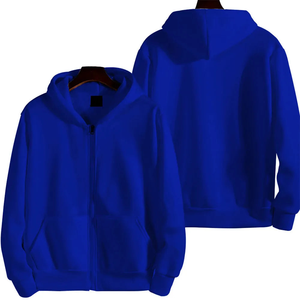 Man wearing a loose-fitting solid colour zip-up sports jacket in a cardigan style.