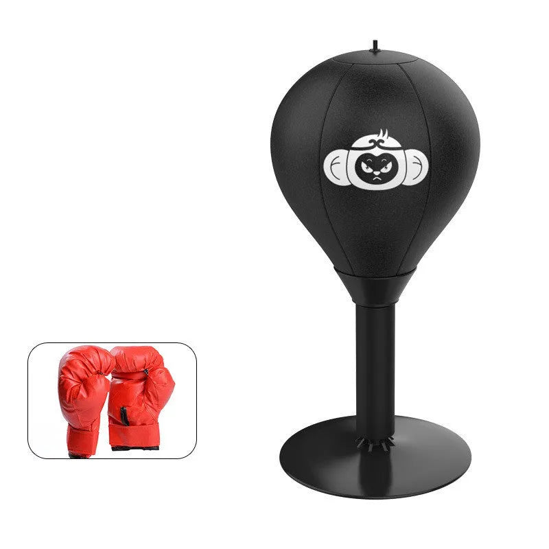 Tabletop boxing speed ball with suction cup base and inflatable PU leather sphere on a desk.