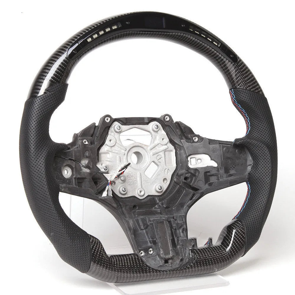 Black carbon fibre BMW steering wheel with LED controls and heating function