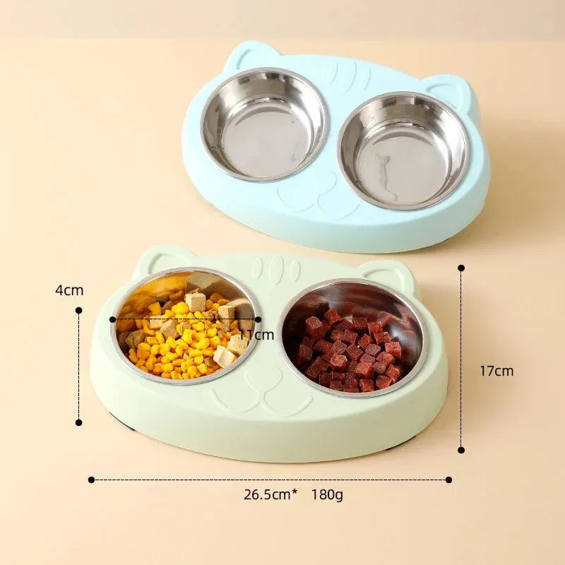 Blue macaron-shaped plastic pet feeding tray with two bowls for cats and small dogs on a white surface