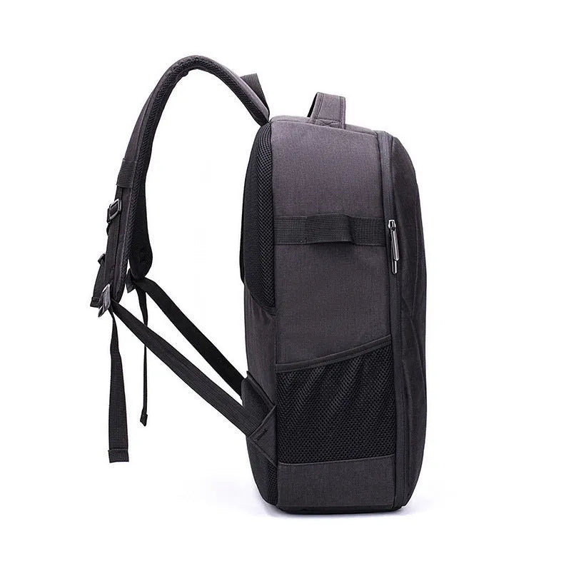 Black Oxford cloth drone backpack showing internal camera, laptop, and organiser pockets.