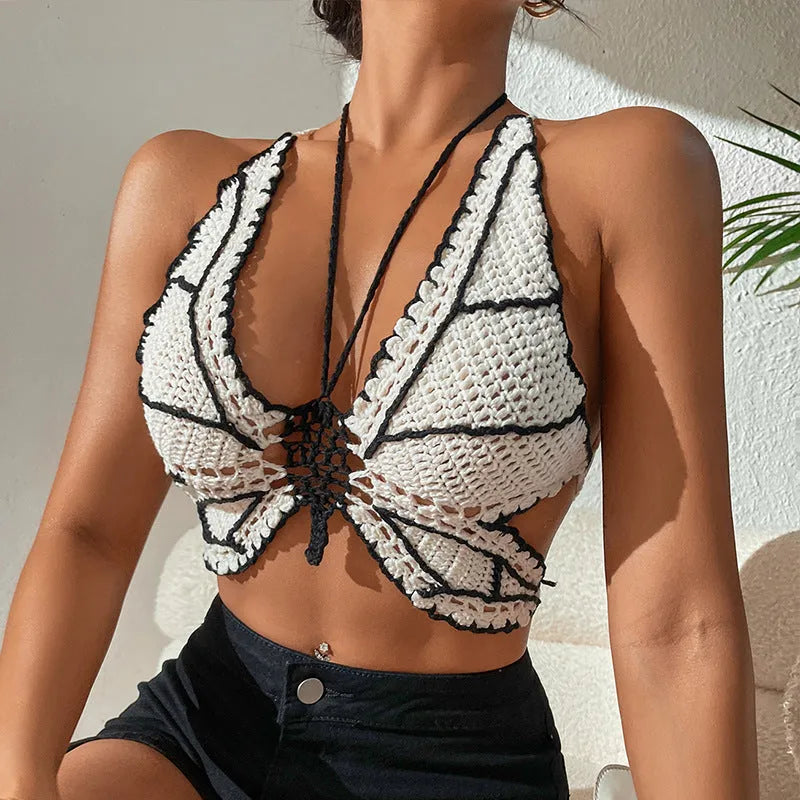 Women's black and white classic bikini swimsuit with matching top on mannequin