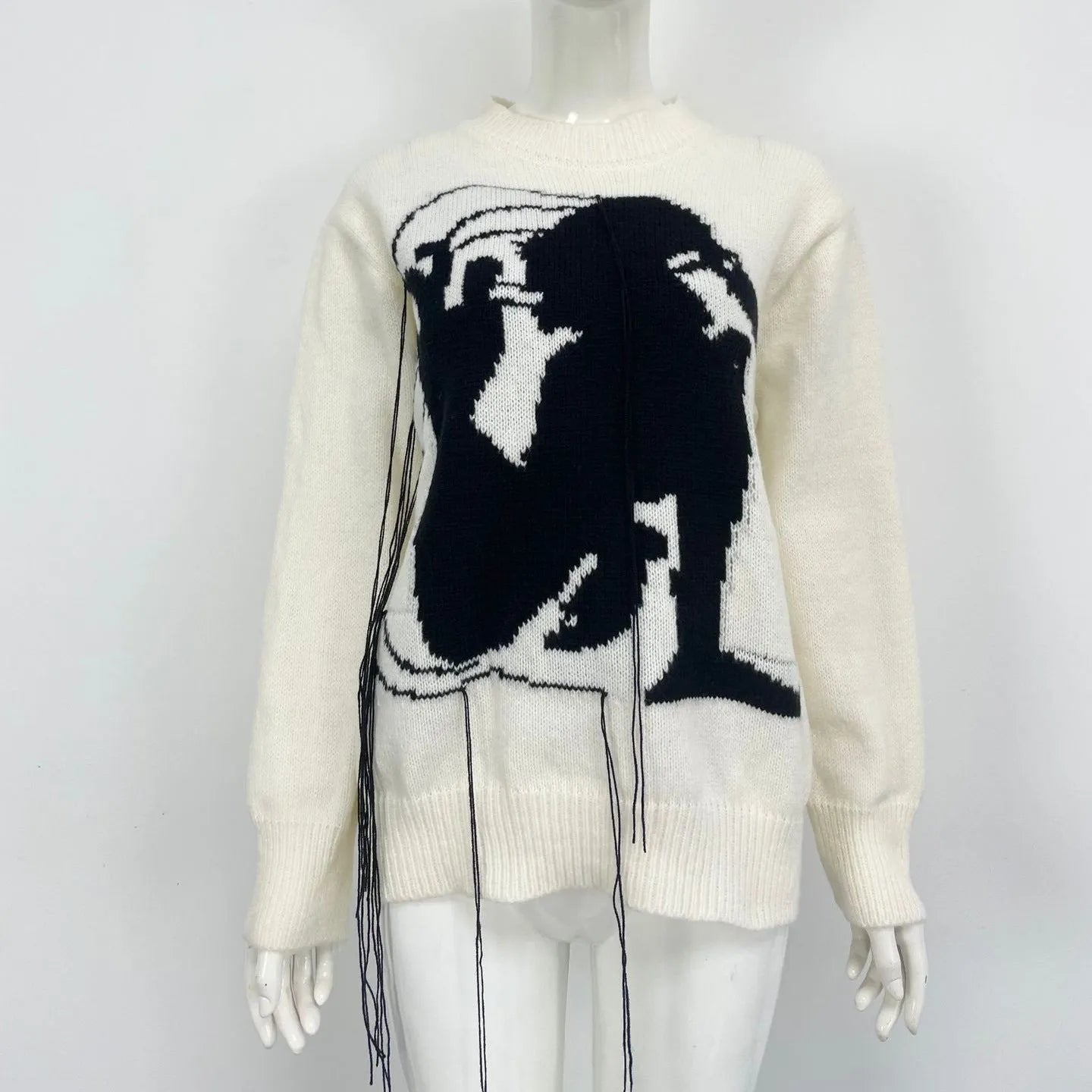 Women's grey alpaca wool sweater with abstract tassel design and round neck