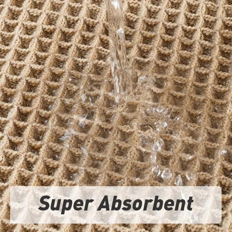 Square checkered-pattern non-slip bathroom carpet in a neutral colour on tiled floor.