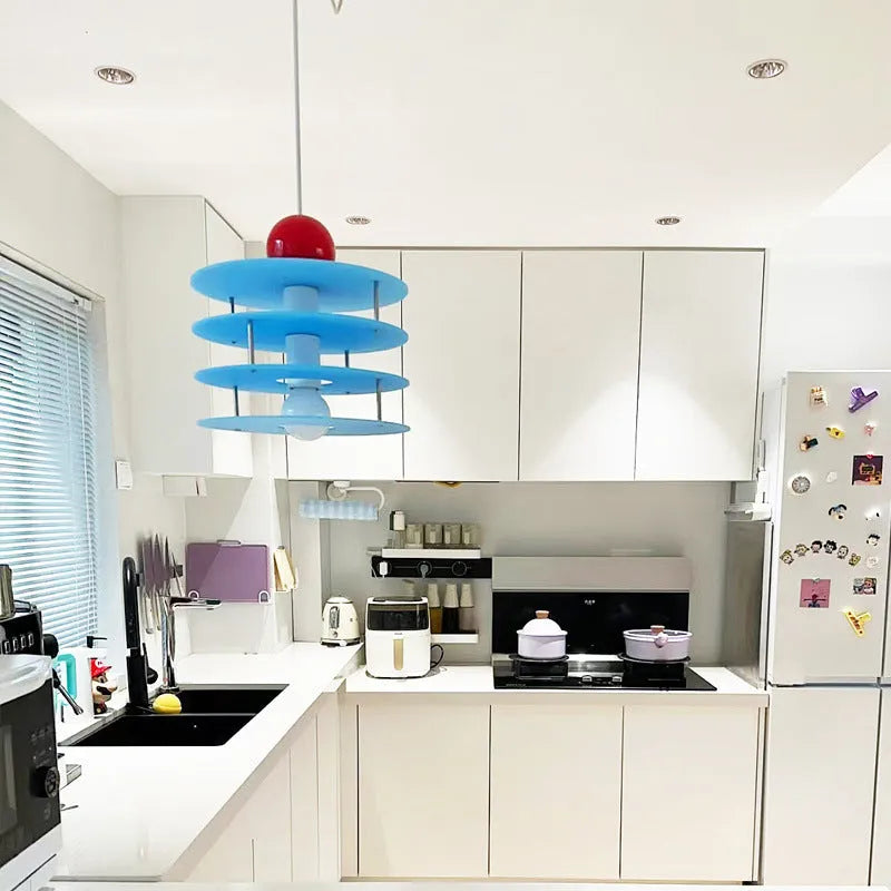 PH5 chandelier light fitting in restaurant setting with adjustable design and frosted colour finish
