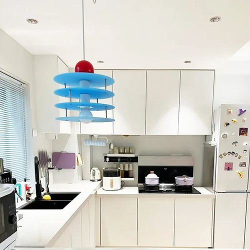 PH5 chandelier light fitting in restaurant setting with adjustable design and frosted colour finish