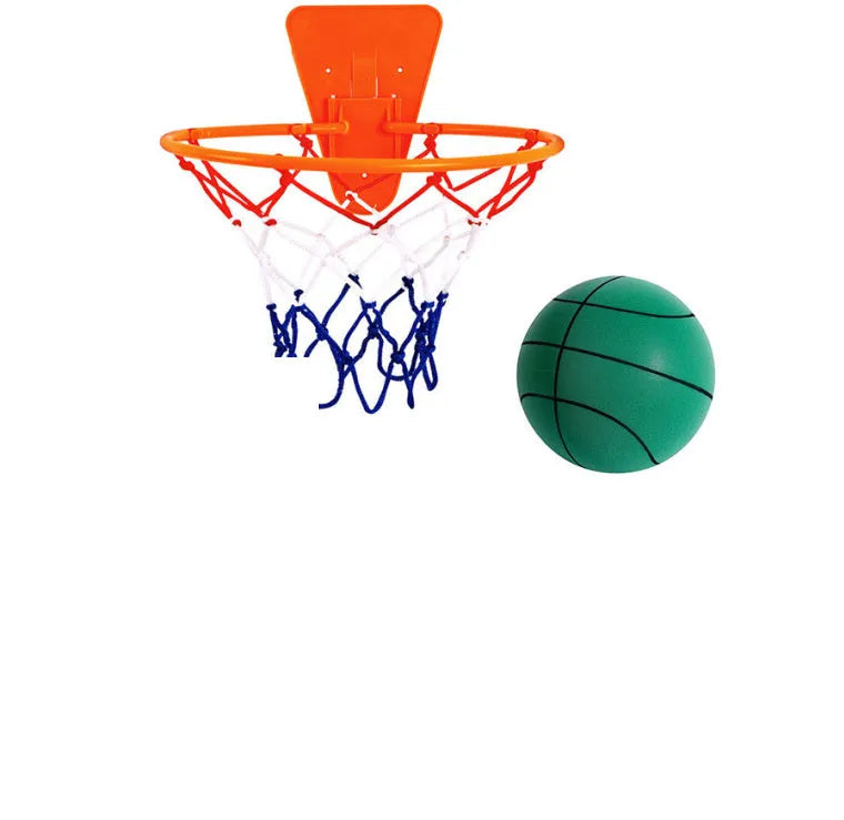 Silent high density foam sports ball in assorted bright colours next to a basketball frame.