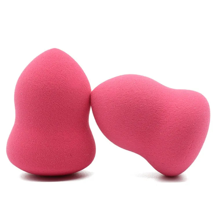 Pink non-latex makeup foundation sponge measuring 4x4x5.6cm