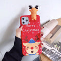 Christmas-themed silicone back cover case for iPhone on a red background.