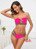 Women's solid colour bikini set with a tube top and split-bottom briefs on a neutral background.