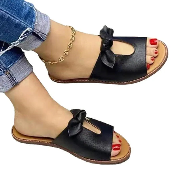 Women's black fish mouth sandals with a decorative bow on the artificial PU upper.