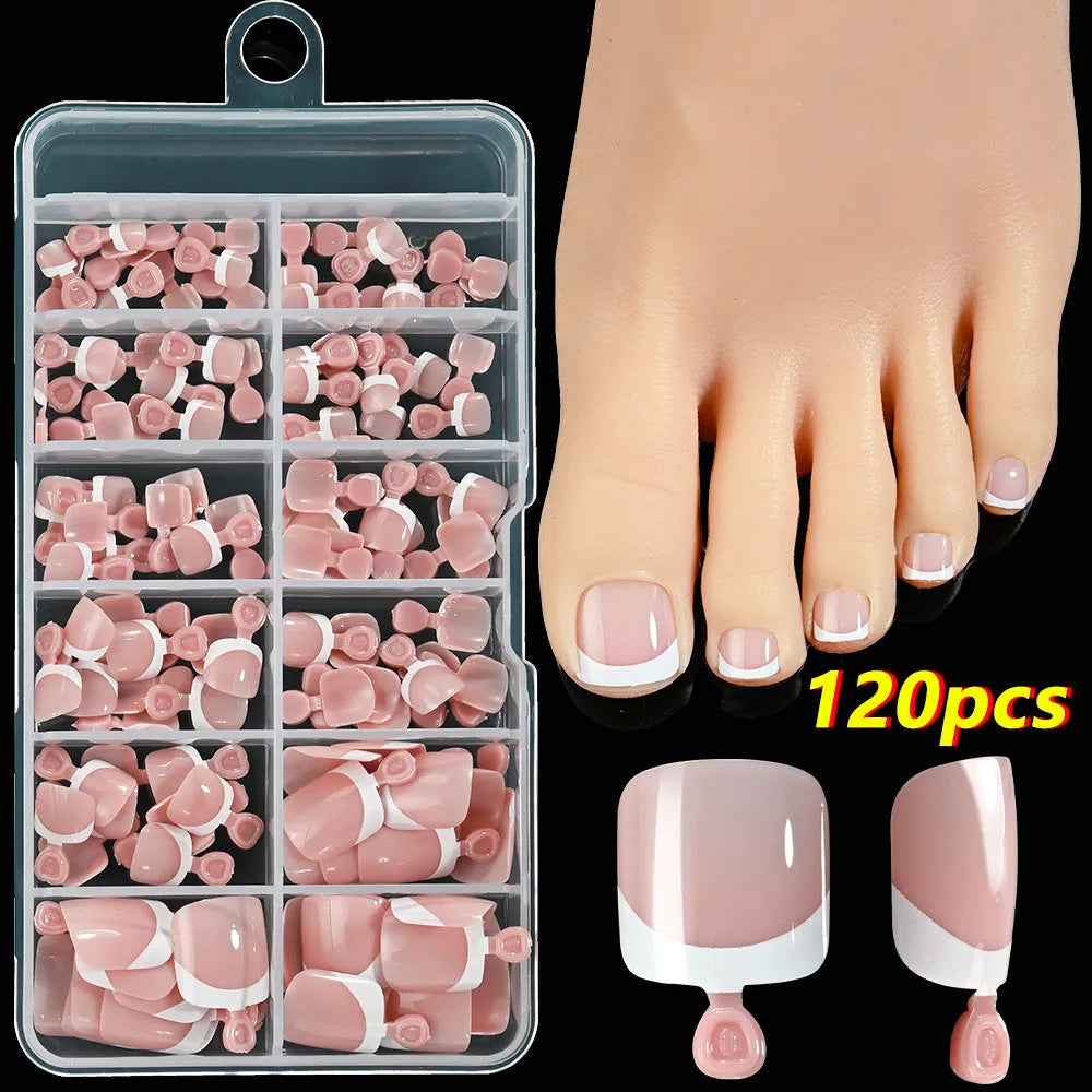 120-piece box of French white tip false toenails in nude colours, square short shape.