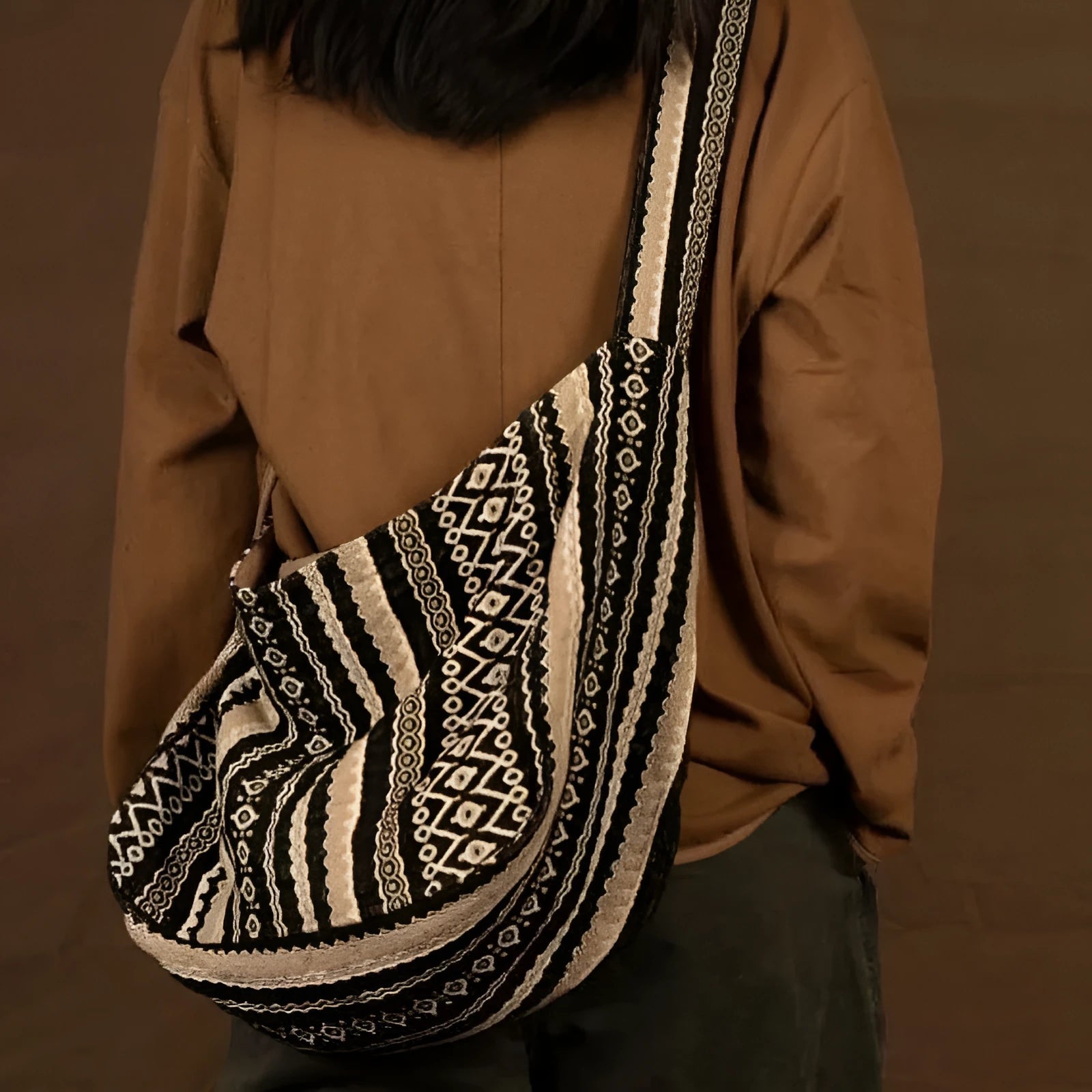 Retro striped corduroy messenger bag with adjustable plaid strap and zipper closure