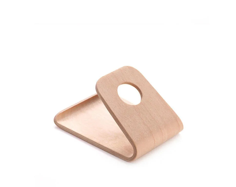Walnut wooden iPhone stand with lazy bracket design on wooden desk