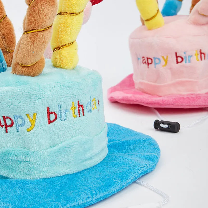 Blue and pink birthday hats for small dogs with elastic bands, shown with dimensions 21cm by 15cm.