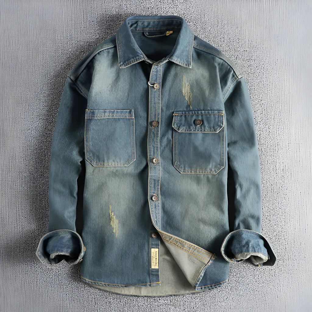 Men's light blue washed vintage denim shirt with long sleeves and a loose cardigan fit.