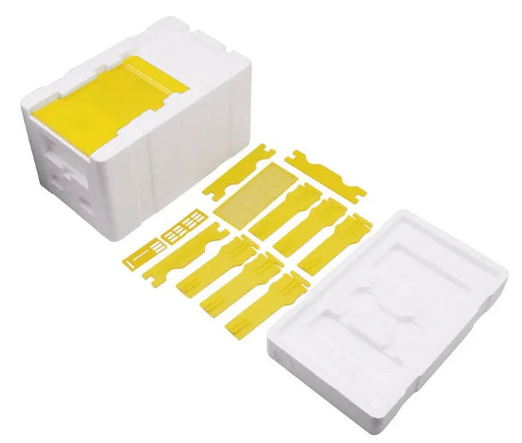 Three white EPS foam bee hive boxes for mating and breeding procedures