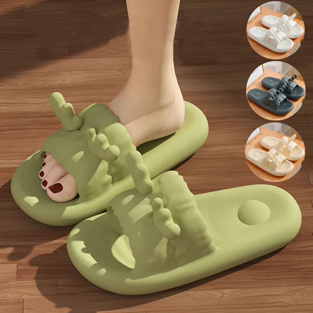 White women's flip flop slippers with deer horn design and hollow-out EVA upper on a light background.