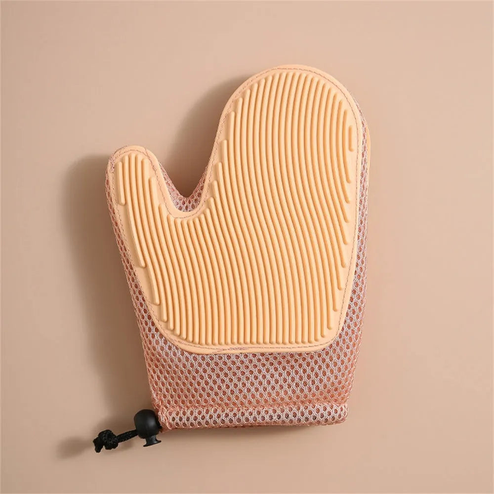 Right-handed mesh pet grooming glove for removing hair from cats and dogs on a dark blue background.
