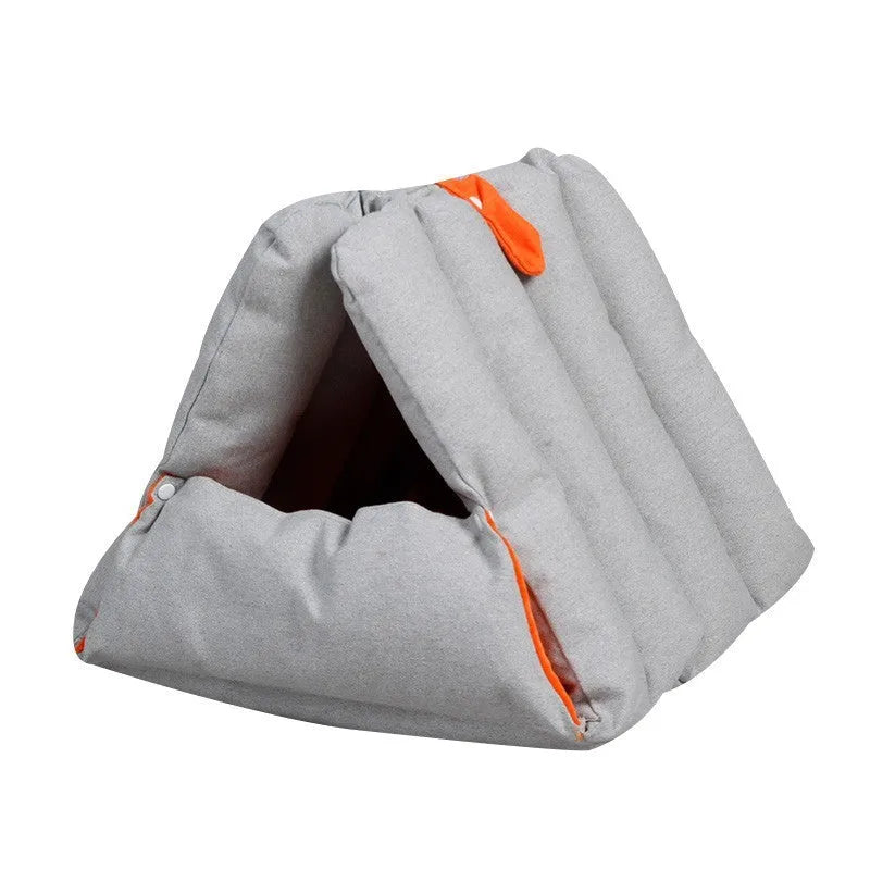 Blue triangular sofa-style cat bed with visible drill holes on the sides for connection.