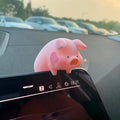 Cute cartoon pig resin figurine designed as a car dashboard decoration accessory.