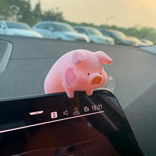Cute cartoon pig resin figurine designed as a car dashboard decoration accessory.