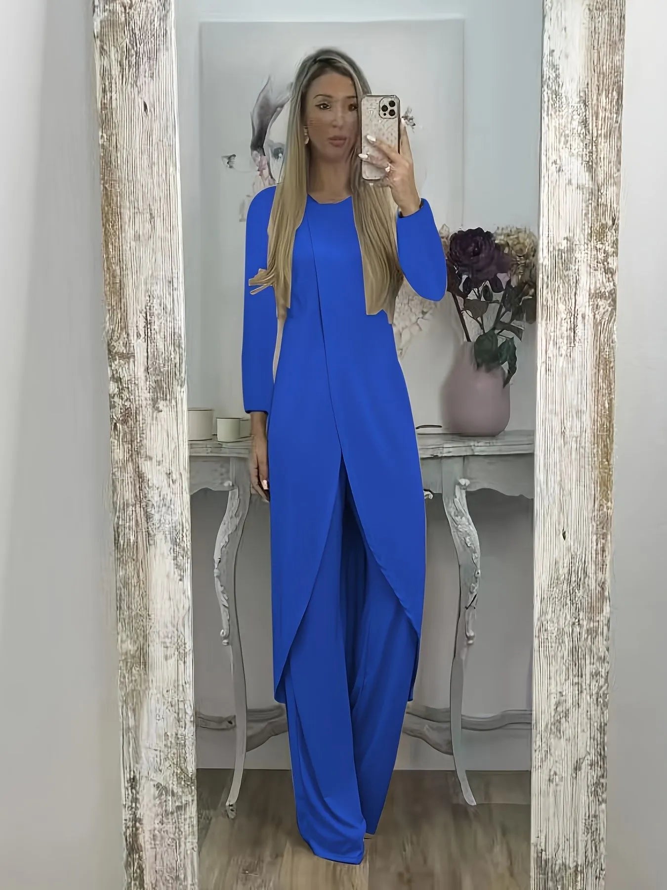 A loose-fitting long sleeve two-piece lounge set in polyester, shown in black, blue, and khaki colour options.